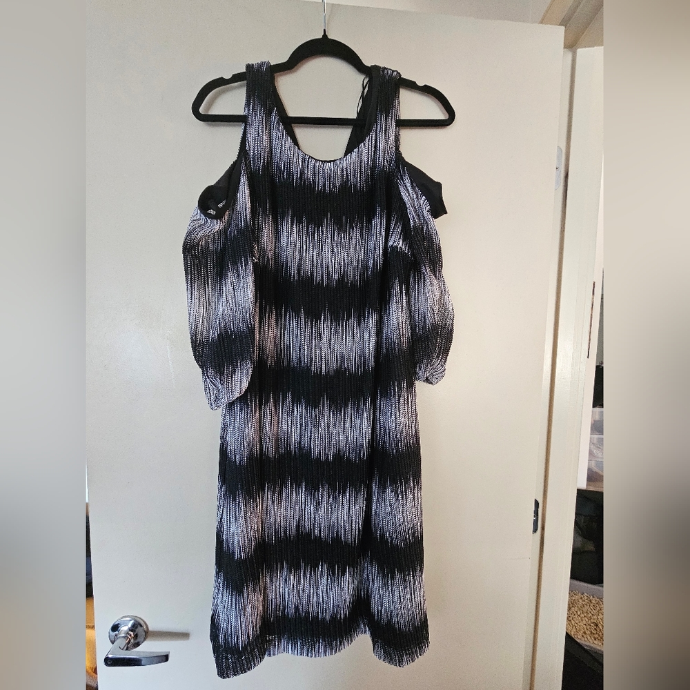 Cold should black and white dress.